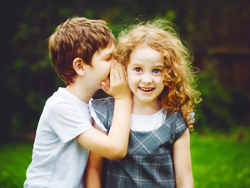 Children whispering
