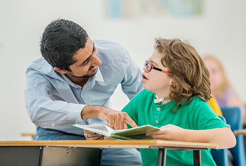 A child with a teacher