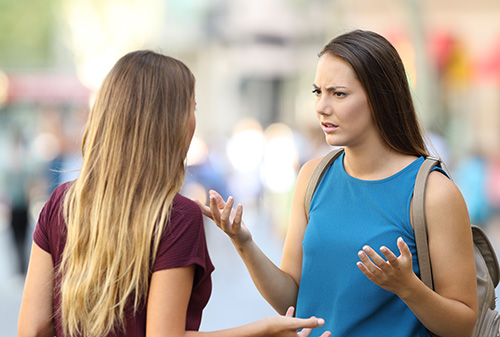 Two women having a serious discussion