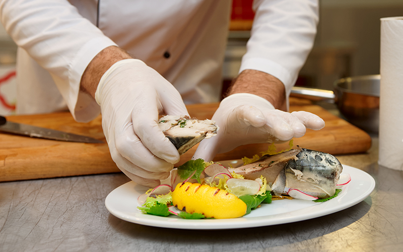 Chef Serving Fish