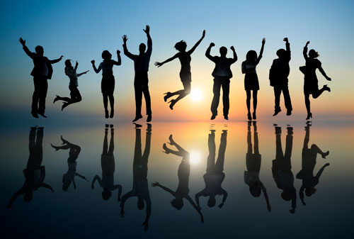 Group of people jumping in the air