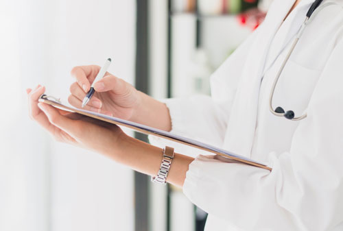 Doctor with medical report